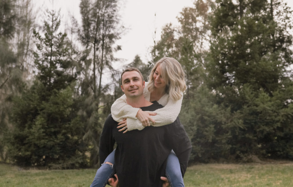Rachel Christopherson Sacramento Fall Winter Engagement Session Pine Trees Piggy Back Ride
