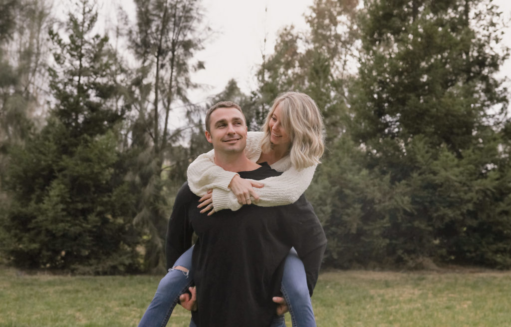 Rachel Christopherson Sacramento Fall Winter Engagement Session Pine Trees Piggy Back Ride