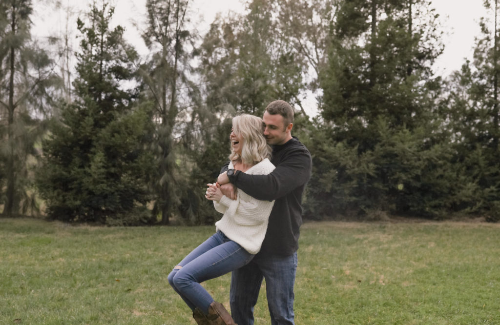 Rachel Christopherson Sacramento California Fall Winter Engagement Session Laughing Lift