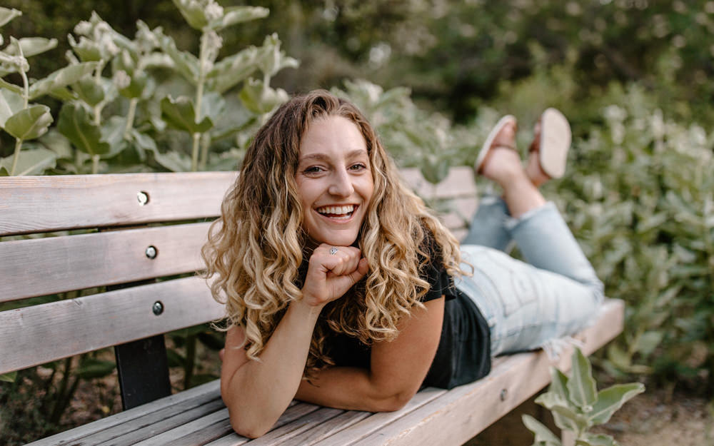 UC Davis Arboretum Portrait Session Sacramento portrait session garden shoot curly hair photos portrait shoot outfit inspo lifestyle photoshoot Sacramento headshot curly hair headshot portrait bench pose Rachel Christopherson photography 