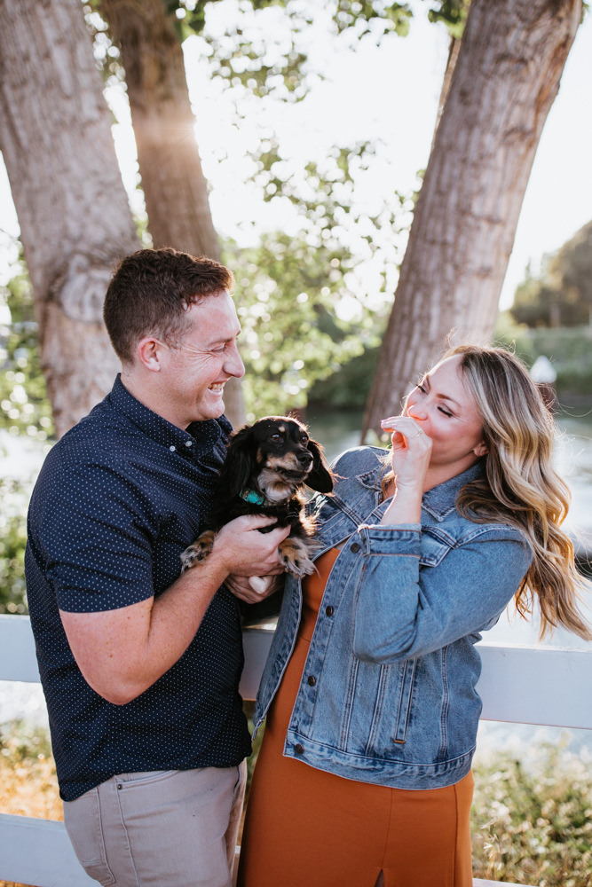 Sacramento River Engagement Session Northern California Weiner dog engagement shoot outfit inspo engagement photos with dog couples shoot posing golden hour sacramento river rachel christopherson photography sunshine