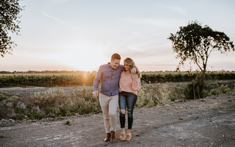 Sacramento River Engagement Session Northern California Weiner dog engagement shoot outfit inspo engagement photos with dog couples shoot posing golden hour sacramento river rachel christopherson photography golden sunset walk