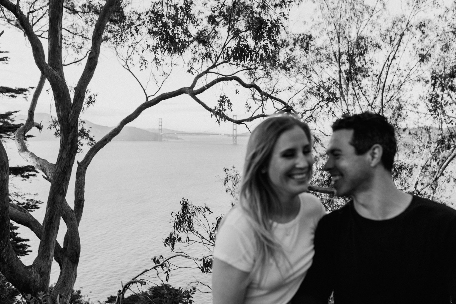 San Francisco Golden Gate Bridge Engagement Session iconic golden gate bridge black and white photo couples posing inspo engagement session outfit Inspo free spirit engagement photos wild and free engagement session bay area bride Rachel christopherson Photography