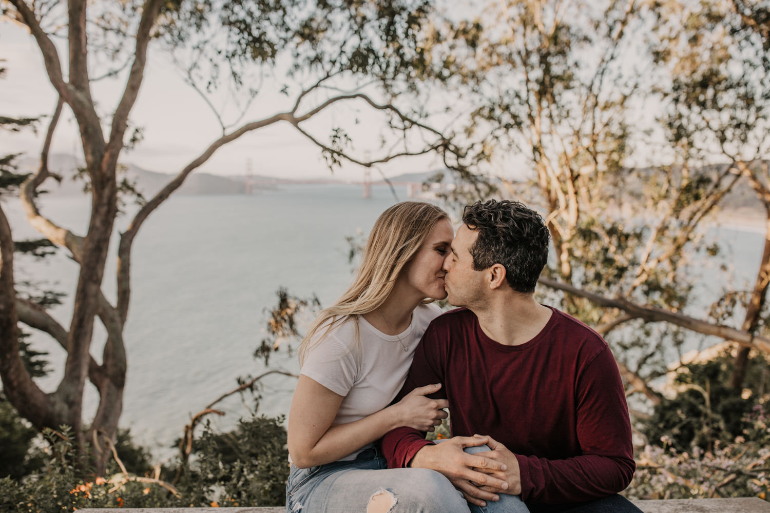 San Francisco Golden Gate Bridge Engagement Session iconic golden gate bridge photo kiss couples posing inspo engagement session outfit Inspo free spirit engagement photos wild and free engagement session bay area bride Rachel christopherson Photography