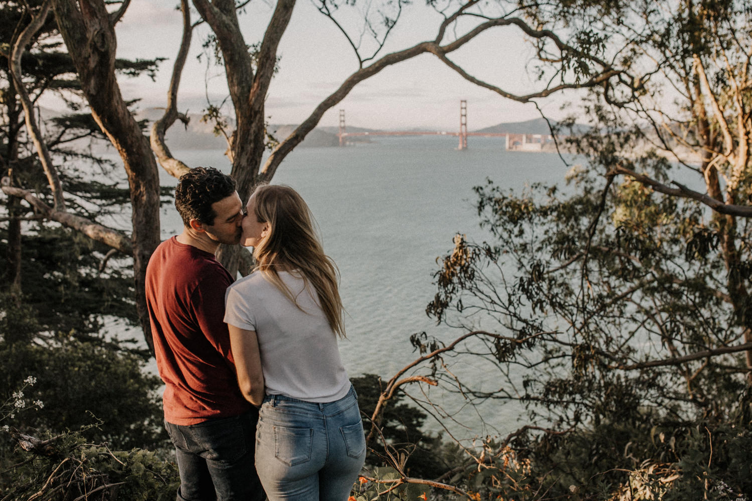 San Francisco Golden Gate Bridge Engagement Session iconic golden gate bridge photo couples posing inspo engagement session outfit Inspo free spirit engagement photos wild and free engagement session bay area bride Rachel christopherson Photography grainy edits