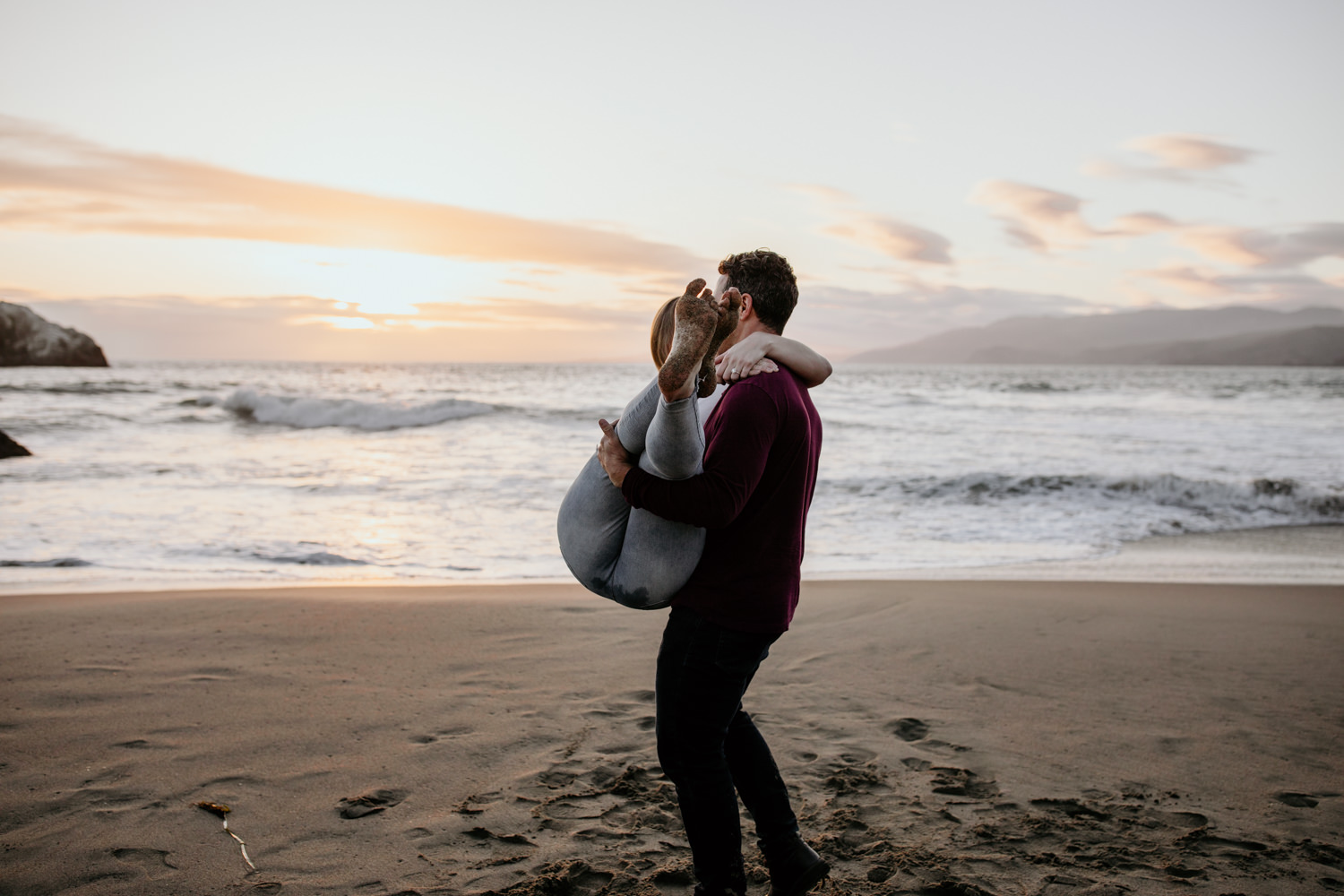 San Francisco engagement session Lands End engagement photos Sutro Baths golden hour photos sunset ocean photos sandy feet happiness couples posing inspo engagement session outfit Inspo free spirit engagement photos wild and free engagement session bay area bride Rachel christopherson Photography