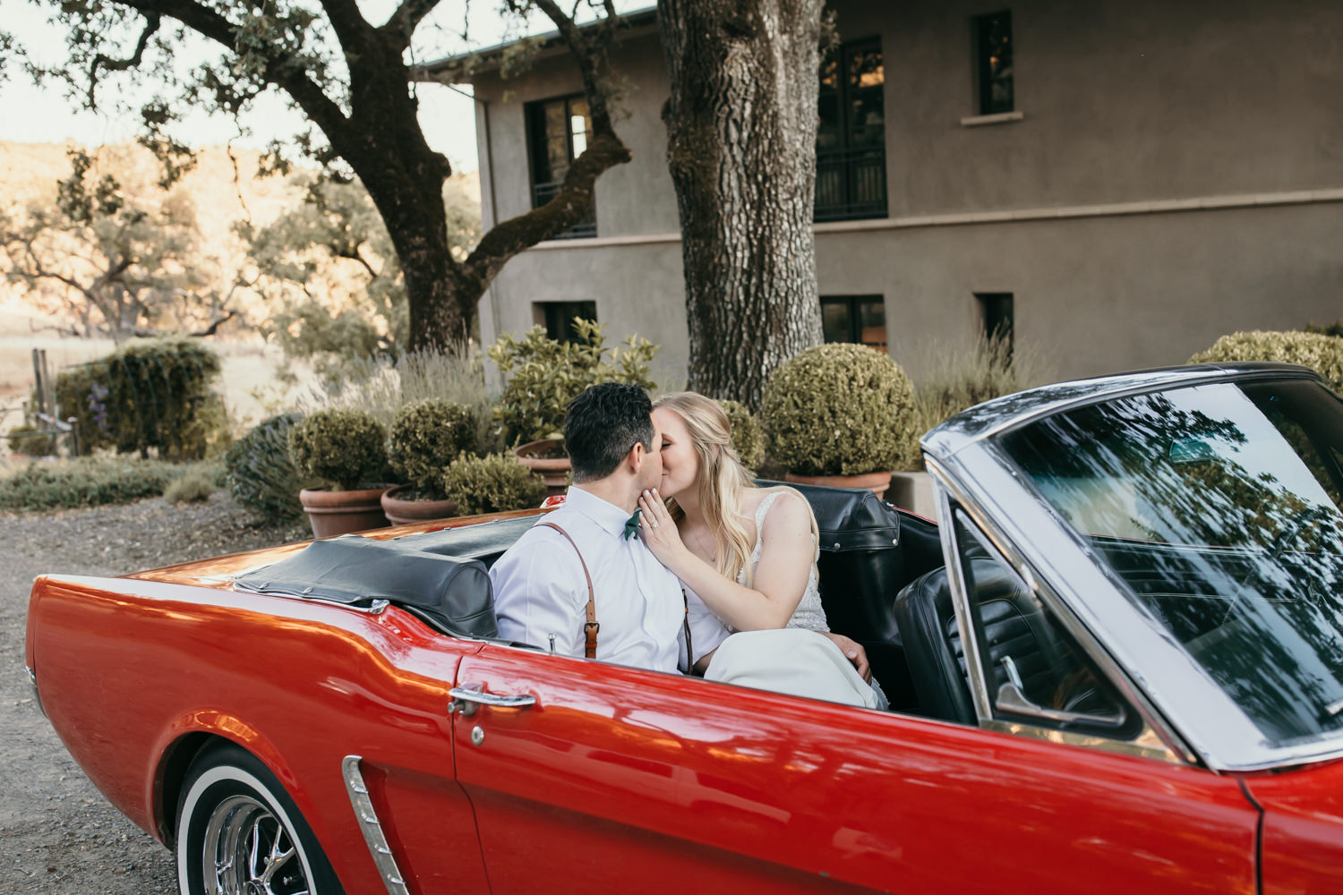 Sonoma micro wedding / winery micro wedding / Sonoma elopement / Sonoma intimate wedding / Sonoma California micro wedding / villa estate wedding / how to have a micro wedding / tips for planning a micro wedding / best places to have a micro wedding in Northern California / Rachel Christopherson Photography  / wedding vintage car / vintage red mustang at wedding 