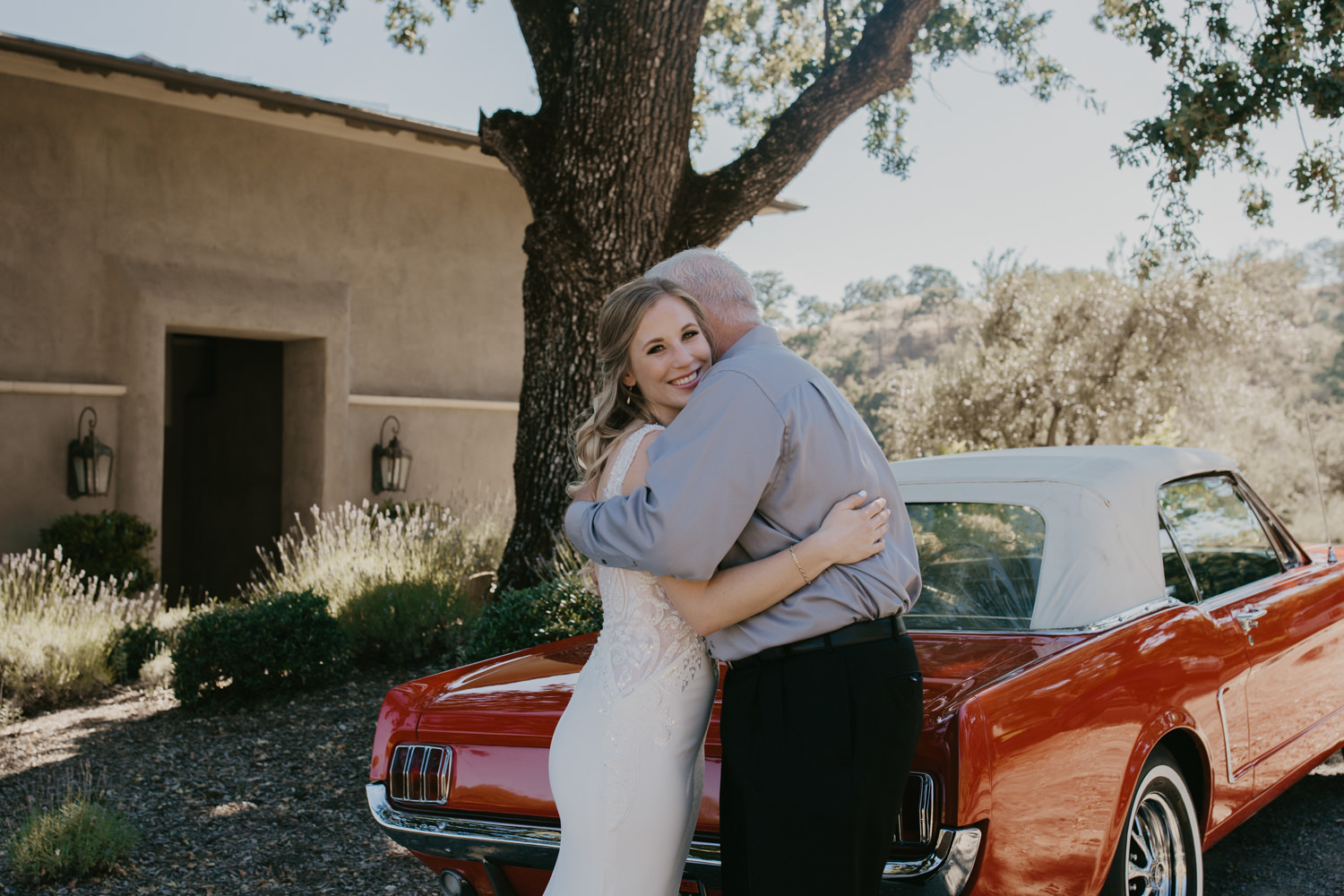 Sonoma micro wedding / winery micro wedding / Sonoma elopement / Sonoma intimate wedding / Sonoma California micro wedding / villa estate wedding / how to have a micro wedding / tips for planning a micro wedding / best places to have a micro wedding in Northern California / Rachel Christopherson Photography  / father of the bride first look / wedding vintage car / vintage red mustang at wedding 