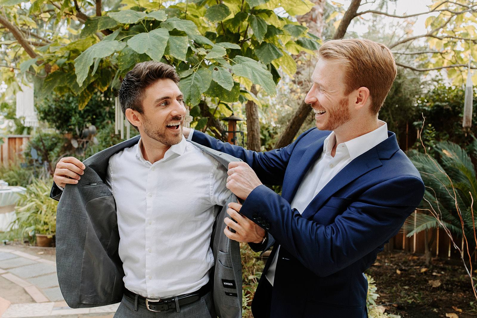 Groom putting on jacket / groom portraits / groom pose / Micro wedding / backyard wedding inspo / backyard wedding / intimate wedding / backyard micro wedding backyard elopement /sacramento micro wedding photography / norcal elopement / backyard garden wedding / garden micro wedding / boho backyard wedding / california micro wedding / norcal micro wedding / sacramento micro wedding / california elopement sacramento wedding photographer 