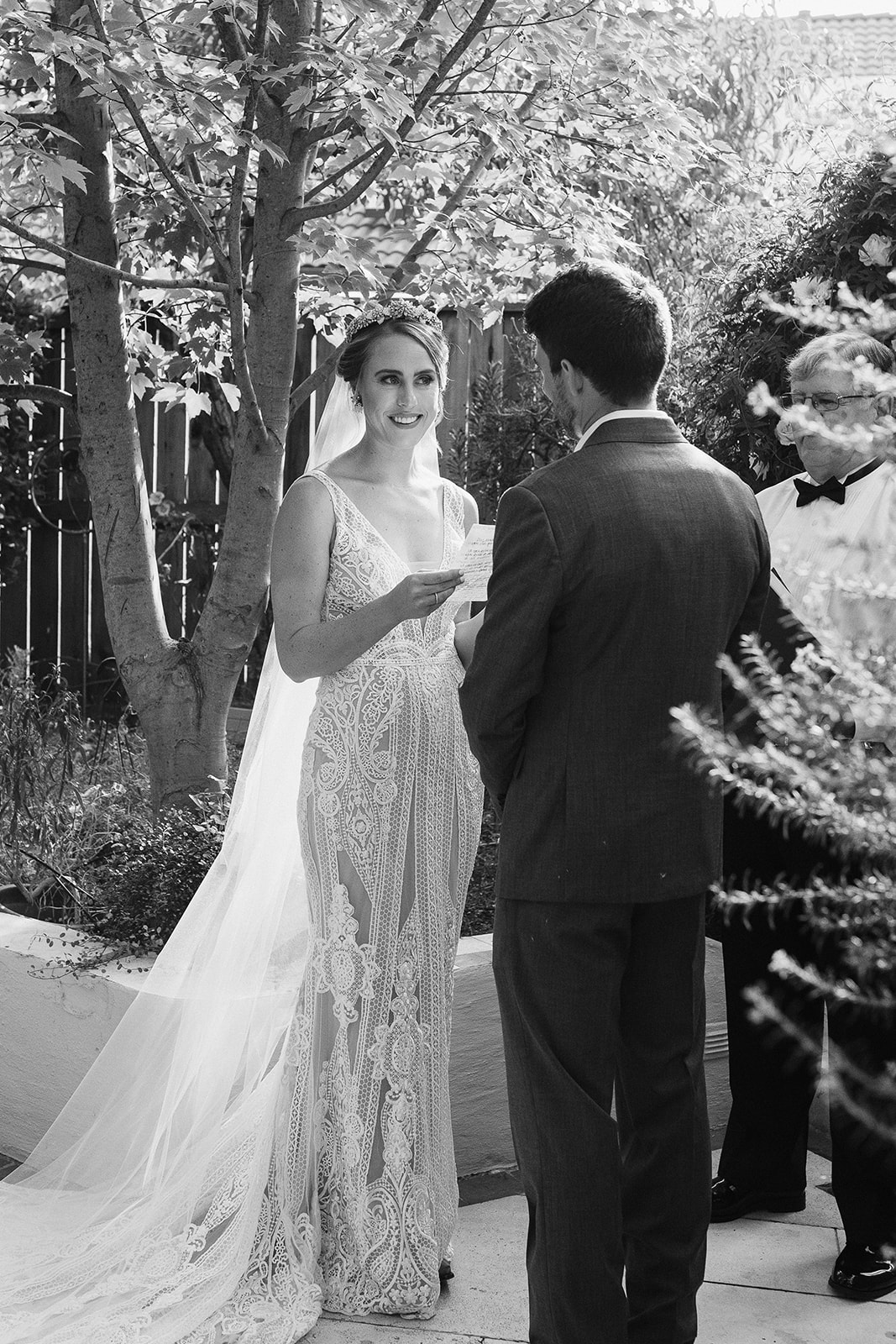 Bride reading vows / Micro wedding / backyard wedding inspo / backyard wedding / intimate wedding / backyard micro wedding backyard elopement /sacramento micro wedding photography / norcal elopement / backyard garden wedding / garden micro wedding / boho backyard wedding / california micro wedding / norcal micro wedding / sacramento micro wedding / california elopement / sacramento wedding photographer 