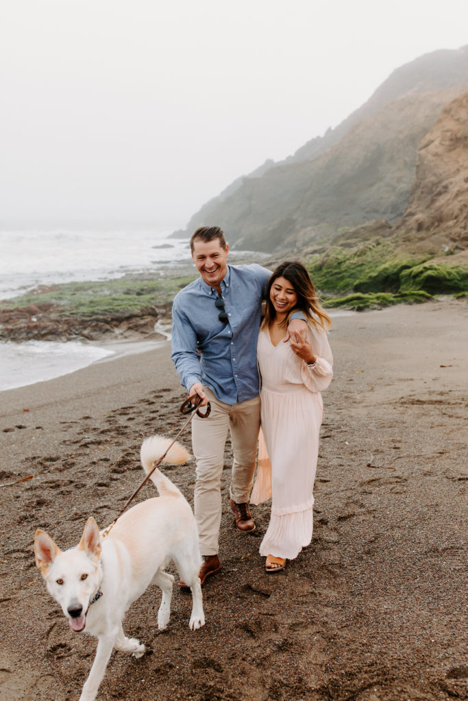 Couple walking with dog, Marin Headlands Engagement Photos, Bay Area Engagement Photos, Bay Area Engagement Photo Locations, Engagement Photo Outfits, Bay Area Beach Engagement Photos, Dog Friendly Bay Area Beaches, Best Locations for Bay Area Engagement Photos, San Francisco Engagement Photos, What to Wear for Engagement Photos, Engagement Photos with dogs, Rachel Christopherson Photography LLC 