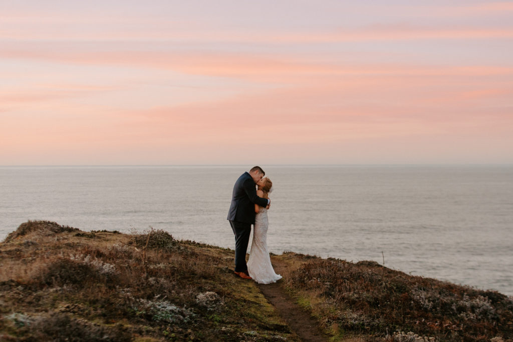 bride and groom sunset kiss at ocean, Mendocino elopement, mendocino wedding, christmas elopement, best places to elope in california, norcal elopement, northern california elopement, elopement inspo, california coast elopement, mendocino california elopement, Rachel Christopherson Photography 