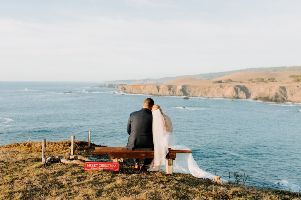 bride and groom sitting at ocean, Mendocino elopement, mendocino wedding, christmas elopement, best places to elope in california, norcal elopement, northern california elopement, elopement inspo, california coast elopement, mendocino california elopement, Rachel Christopherson Photography 