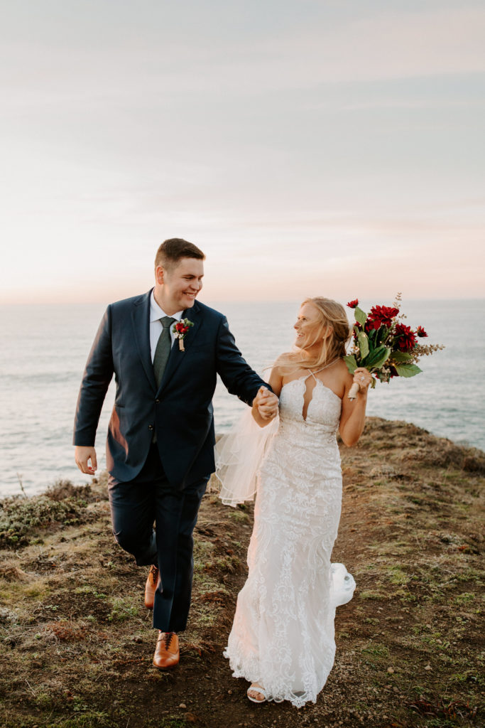 bride and groom holding hands at ocean, Mendocino elopement, mendocino wedding, christmas elopement, best places to elope in california, norcal elopement, northern california elopement, elopement inspo, california coast elopement, mendocino california elopement, Rachel Christopherson Photography 