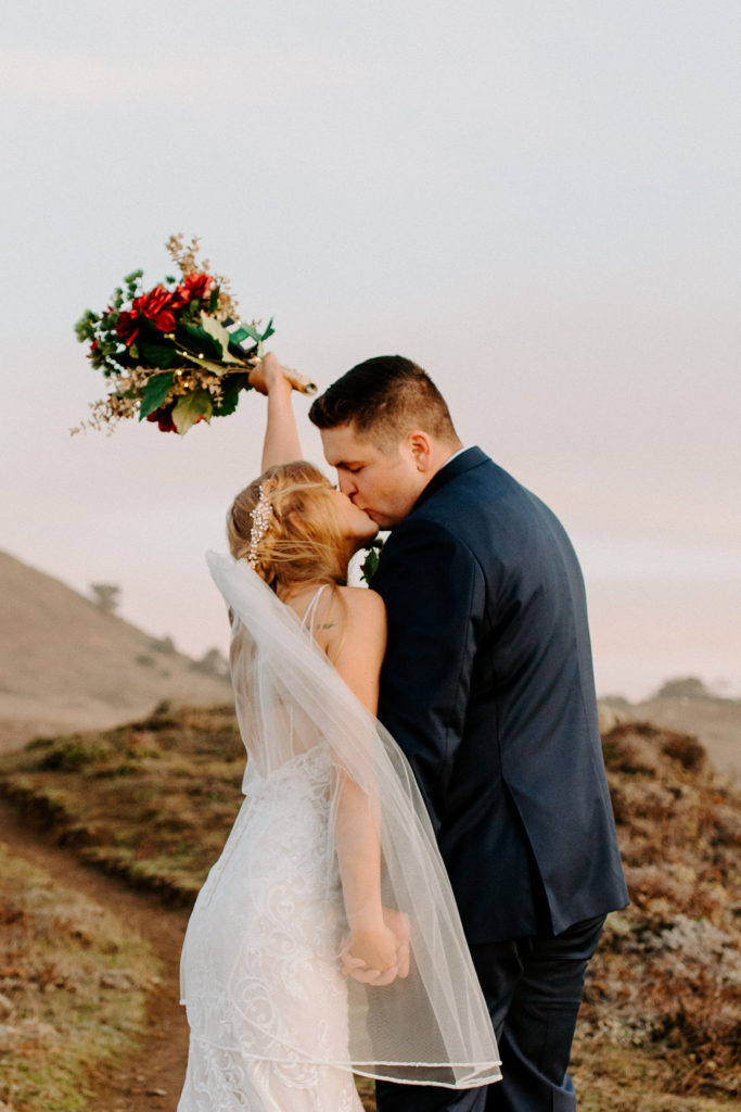 bride and groom kiss on cliff,
 Mendocino elopement, mendocino wedding, christmas elopement, best places to elope in california, norcal elopement, northern california elopement, elopement inspo, california coast elopement, mendocino california elopement, Rachel Christopherson Photography 