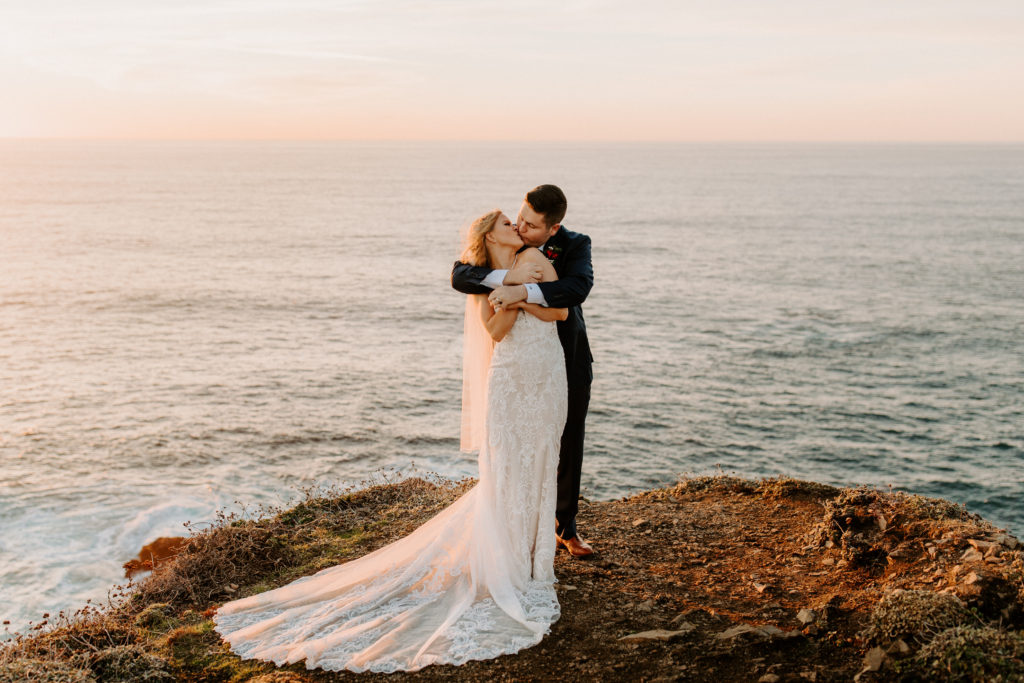 groom hugs bride from behind, Mendocino elopement, mendocino wedding, christmas elopement, best places to elope in california, norcal elopement, northern california elopement, elopement inspo, california coast elopement, mendocino california elopement, Rachel Christopherson Photography 