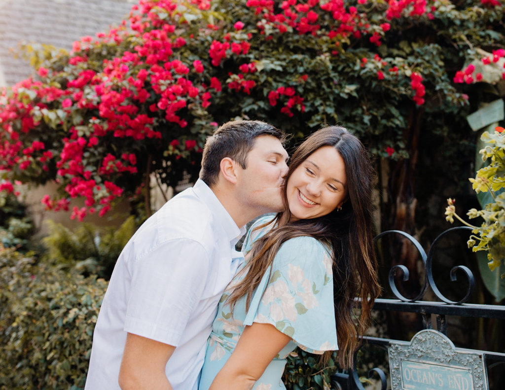 man kissing woman playfully,  Carmel CA Engagement Photos, Monterey Engagement Photos, Monterey Engagement Photo Locations, Engagement Photo Outfits, Carmel by the sea Engagement Photos, Best Locations for Monterey Engagement Photos, What to Wear for Engagement Photos, Rachel Christopherson Photography LLC