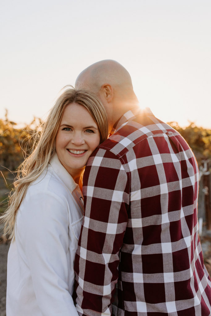 couple in golden vineyard, vineyard engagement photos, Sacramento engagement photos, sacramento engagement, sacramento engagement photographer sacramento engagement photo locations, sacramento wedding photographer, rachel christopherson photography, engagement photo outfit inspo