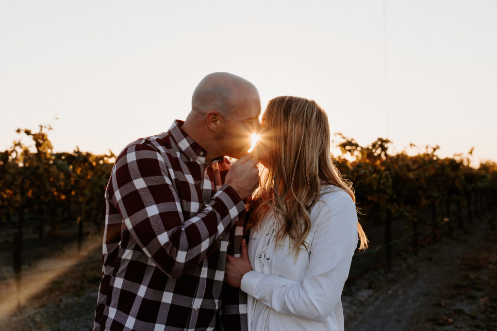 couple in golden vineyard during sunset, vineyard engagement photos, Sacramento engagement photos, sacramento engagement, sacramento engagement photographer sacramento engagement photo locations, sacramento wedding photographer, rachel christopherson photography, engagement photo outfit inspo