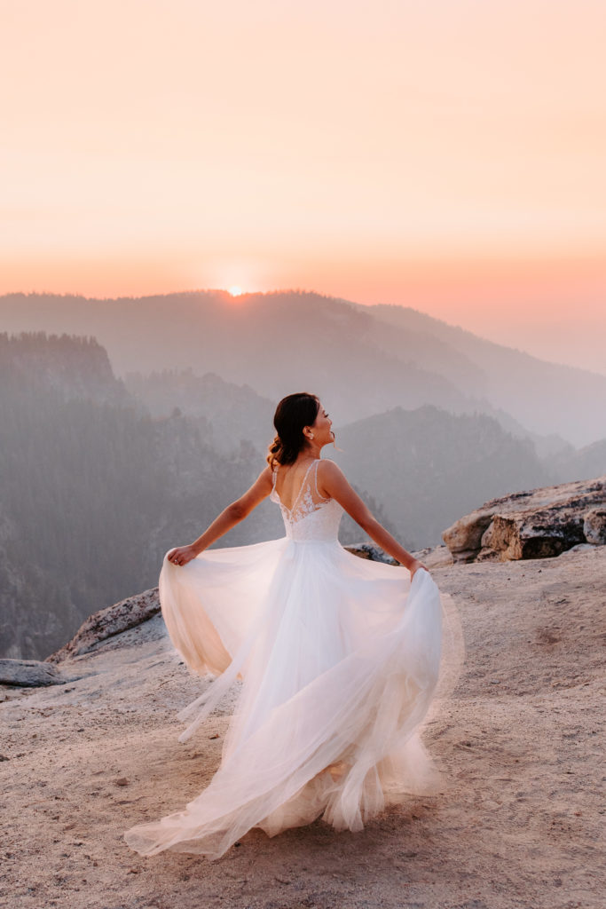bride twirling sunset photos, Taft Point elopement, bridal portrait, adventurous bride, Yosemite Elopement, Glacier Point Elopement, best places to elope in california, northern california elopement, Rachel Christopherson Photography