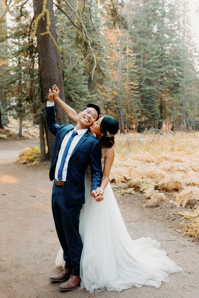 bride and groom in forest, adventurous bride, wedding dress and hiking boots, Taft Point elopement, Yosemite Elopement, Glacier Point Elopement, best places to elope in california, northern california elopement, Rachel Christopherson Photography