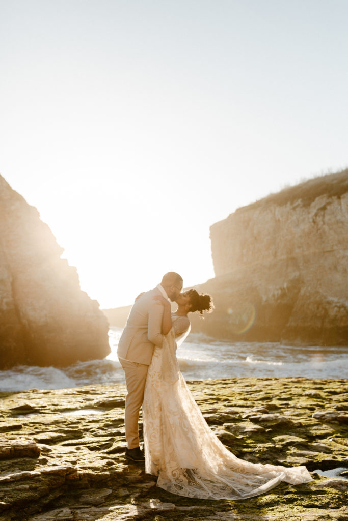 groom dipping bride for kiss at sunset, Santa cruz wedding, santa cruz elopement, santa cruz wedding photographer, santa cruz elopement photographer, big sur elopement, boho beach bride, california boho elopement, boho wedding dress, best places to elope in California, California elopement, California beach elopement, boho bride inspo, Rachel Christopherson Photography