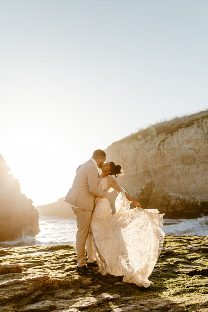 groom dipping bride for kiss at sunset, Santa cruz wedding, santa cruz elopement, santa cruz wedding photographer, santa cruz elopement photographer, big sur elopement, boho beach bride, california boho elopement, boho wedding dress, best places to elope in California, California elopement, California beach elopement, boho bride inspo, Rachel Christopherson Photography