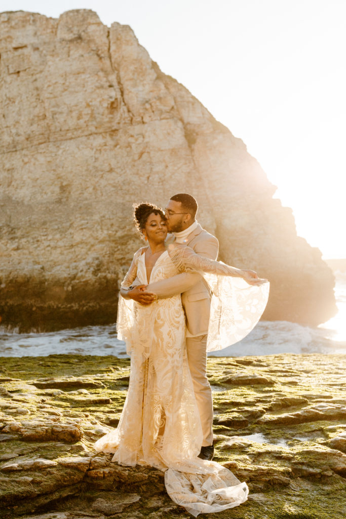 groom kissing brides cheek, Santa cruz wedding, santa cruz elopement, santa cruz wedding photographer, santa cruz elopement photographer, big sur elopement, boho beach bride, california boho elopement, boho wedding dress, best places to elope in California, California elopement, California beach elopement, boho bride inspo, Rachel Christopherson Photography