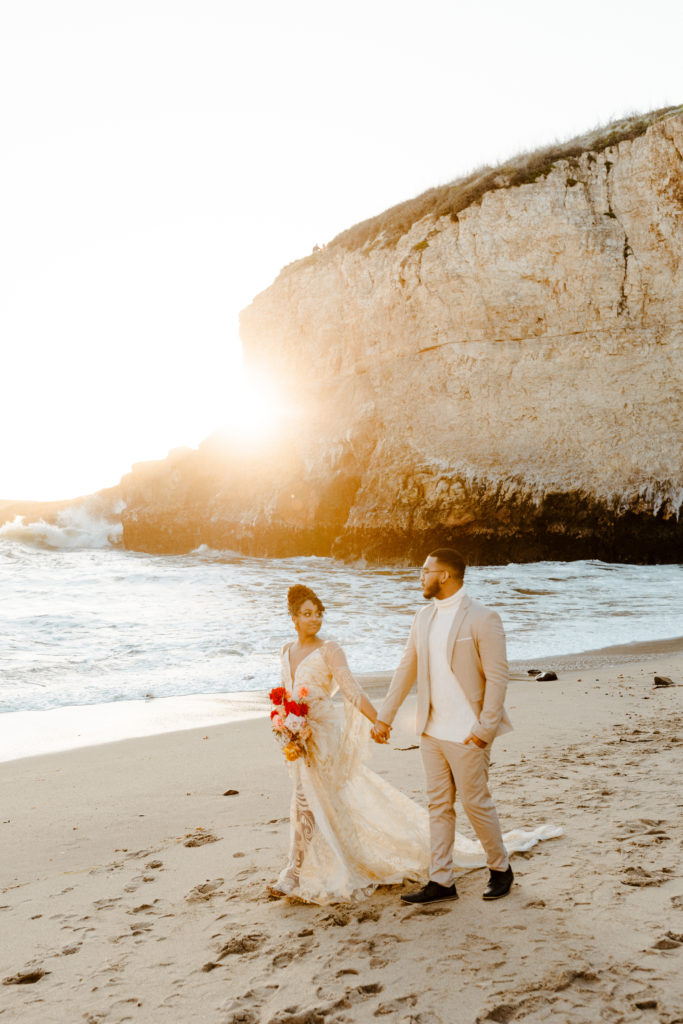 bride and groom walking on beach, Santa cruz wedding, santa cruz elopement, santa cruz wedding photographer, santa cruz elopement photographer, big sur elopement, boho beach bride, california boho elopement, boho wedding dress, best places to elope in California, California elopement, California beach elopement, boho bride inspo, Rachel Christopherson Photography