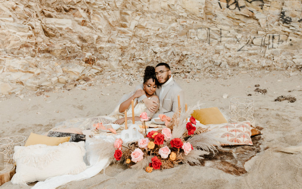 bride and groom at wedding beach picnic, Santa cruz wedding, santa cruz elopement, santa cruz wedding photographer, santa cruz elopement photographer, big sur elopement, boho beach bride, california boho elopement, boho wedding dress, best places to elope in California, California elopement, California beach elopement, boho bride inspo, Rachel Christopherson Photography