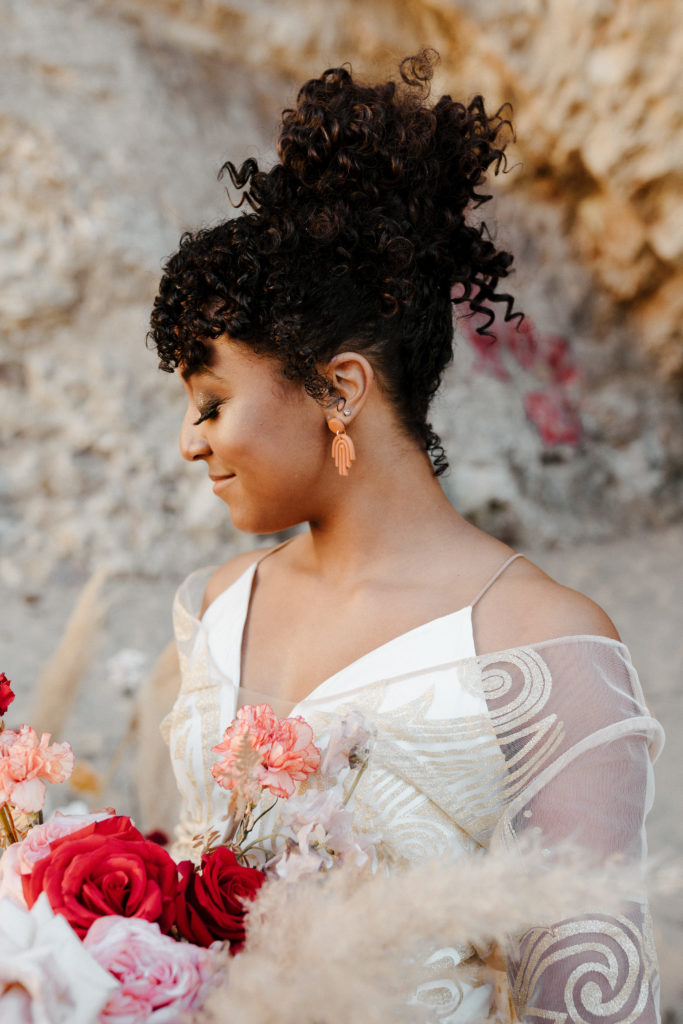 bride looking down, boho bridal earrings, Santa cruz wedding, santa cruz elopement, santa cruz wedding photographer, santa cruz elopement photographer, big sur elopement, boho beach bride, california boho elopement, boho wedding dress, best places to elope in California, California elopement, California beach elopement, boho bride inspo, Rachel Christopherson Photography