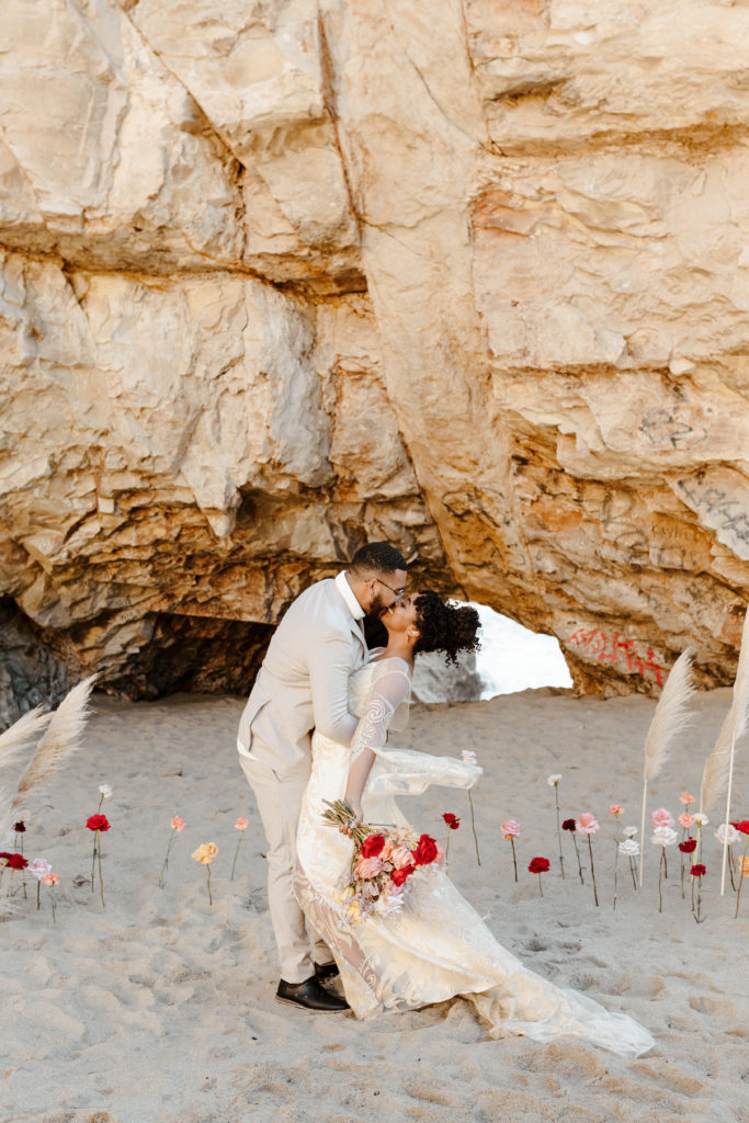 Bride kissing groom under cave, Santa cruz wedding, santa cruz elopement, santa cruz wedding photographer, santa cruz elopement photographer, big sur elopement, boho beach bride, california boho elopement, best places to elope in California, California elopement, California beach elopement, boho bride inspo, boho wedding dress, Rachel Christopherson Photography
