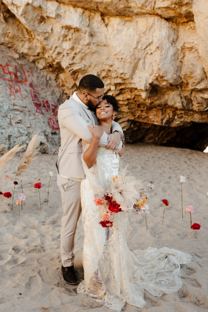 groom hugging bride from behind, Santa cruz wedding, santa cruz elopement, santa cruz wedding photographer, santa cruz elopement photographer, big sur elopement, boho beach bride, california boho elopement, best places to elope in California, California elopement, California beach elopement, boho bride inspo, boho wedding dress, Rachel Christopherson Photography