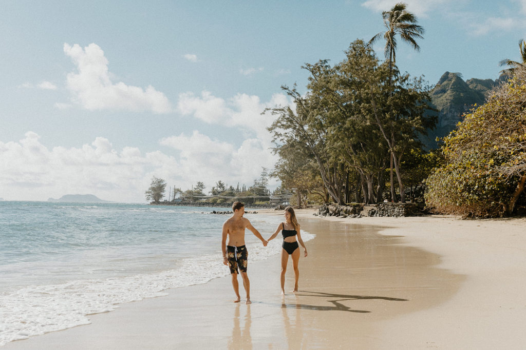 Oahu wedding photographer, Oahu engagement photos, best places to take photos in Oahu, best Oahu hikes, Hawaii wedding photographer, Hawaii engagement photos, best Hawaii hikes, Maui wedding photographer, Maui engagement photos, Kauai wedding photographer, Kauai engagement photos, what to wear for your engagement photos, engagement outfits, casual engagement photos outfits, neutral engagement photo outfits, tropical engagement photos, engagement photo ideas, what to wear for engagement pictures, beach engagement photos, Hawaii beaches, Rachel Christopherson Photography 