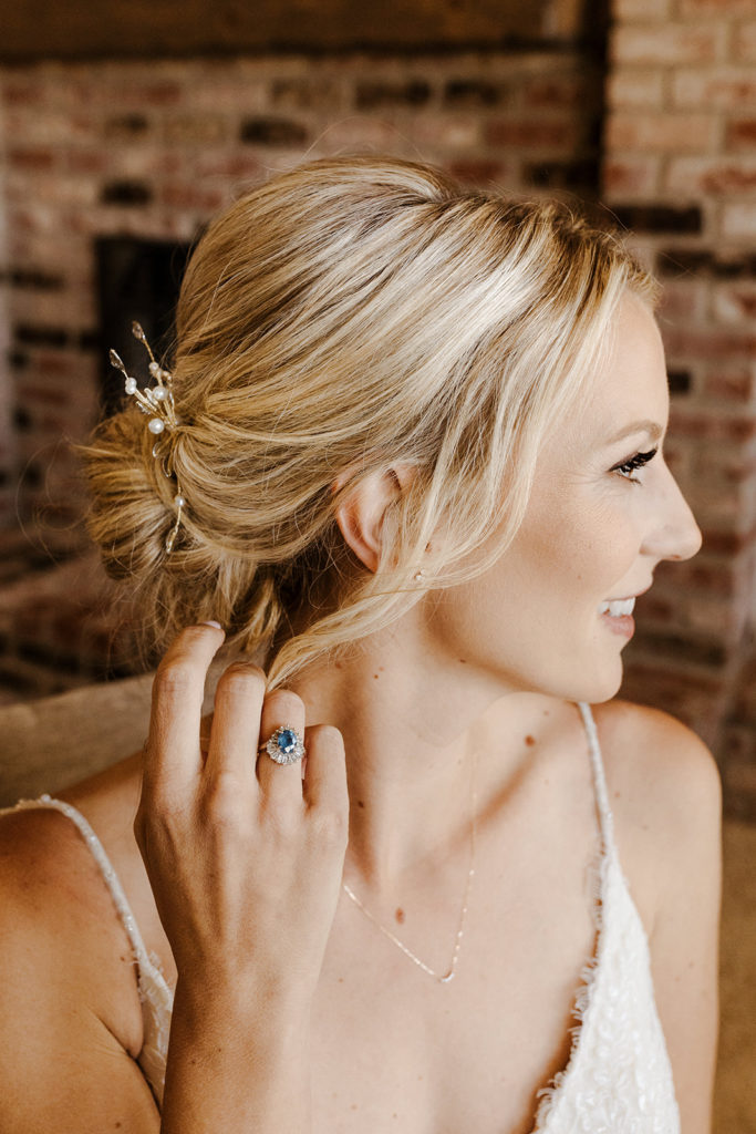 Sacramento wedding / sac wedding / California wedding / Northern California wedding / Sacramento wedding photographer / backyard wedding inspiration / orchard wedding photos / bay area wedding / bay area wedding photographer / california wedding photographer / Rachel Christopherson Photography / Bride getting ready / bridesmaid getting ready / bride low messy bun / bride natural makeup / bride hair accessory