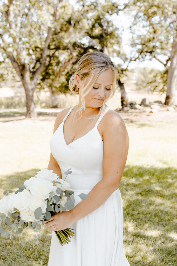 Sacramento wedding, sacramento wedding photographer, river highlands ranch, river highlands ranch wedding, barn wedding sacramento, rustic wedding venue sacramento, best places to get married in sacramento, vineyard wedding sacramento, sacramento winery wedding, northern california barn wedding venues, rachel christopherson photography, blue bridesmaids dresses, crepe wedding dress, wedding hair low bun, bridal portraits, white wedding bouquet
