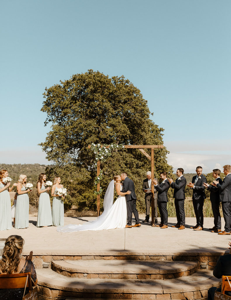 Sacramento wedding, sacramento wedding photographer, river highlands ranch, river highlands ranch wedding, barn wedding sacramento, rustic wedding venue sacramento, best places to get married in sacramento, vineyard wedding sacramento, sacramento winery wedding, northern california barn wedding venues, rachel christopherson photography, rustic wedding ceremony, bride and groom first kiss, wedding first kiss