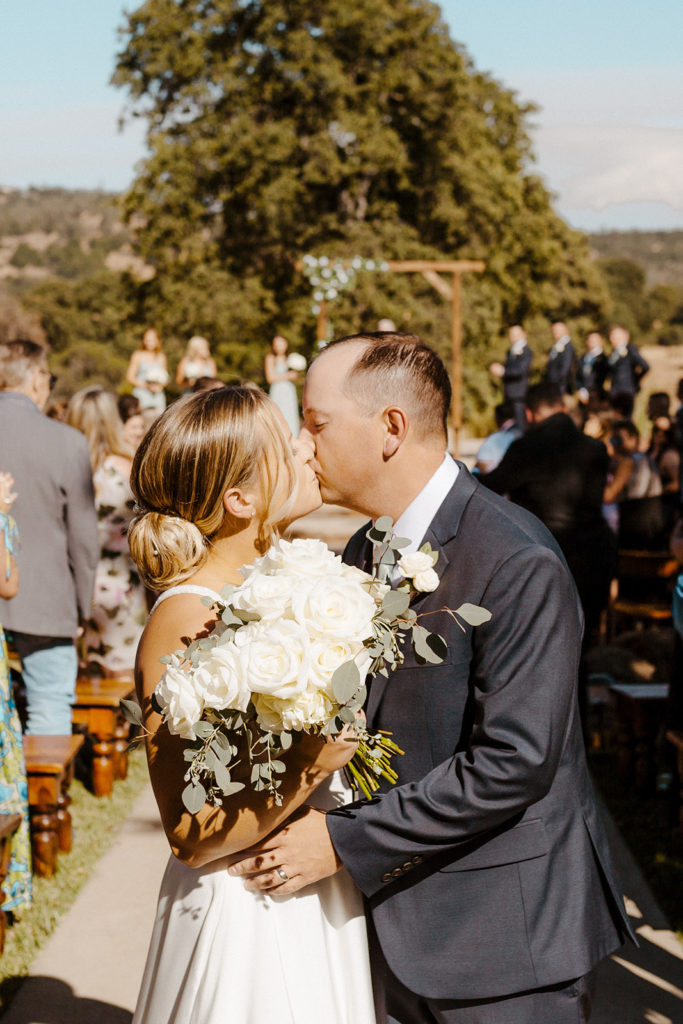 Sacramento wedding, sacramento wedding photographer, river highlands ranch, river highlands ranch wedding, barn wedding sacramento, rustic wedding venue sacramento, best places to get married in sacramento, vineyard wedding sacramento, sacramento winery wedding, northern california barn wedding venues, rachel christopherson photography, rustic wedding ceremony, bride and groom end of aisle kiss