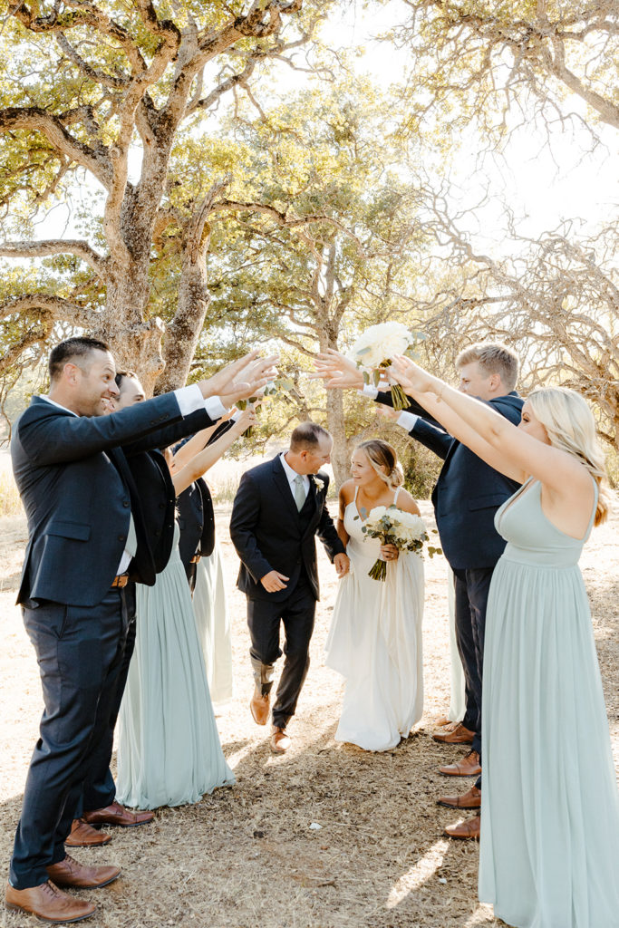 Sacramento wedding, sacramento wedding photographer, river highlands ranch, river highlands ranch wedding, barn wedding sacramento, rustic wedding venue sacramento, best places to get married in sacramento, vineyard wedding sacramento, sacramento winery wedding, northern california barn wedding venues, rachel christopherson photography, blue bridesmaids dresses, wedding party tunnel, wedding party photos