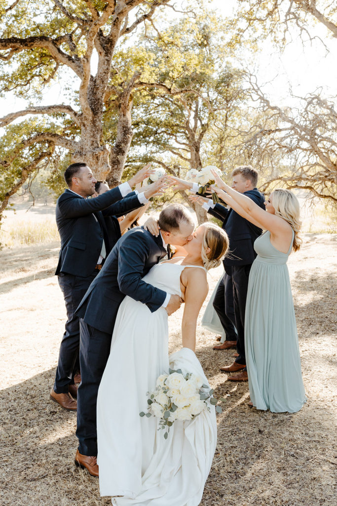 Sacramento wedding, sacramento wedding photographer, river highlands ranch, river highlands ranch wedding, barn wedding sacramento, rustic wedding venue sacramento, best places to get married in sacramento, vineyard wedding sacramento, sacramento winery wedding, northern california barn wedding venues, rachel christopherson photography, blue bridesmaids dresses, wedding party tunnel, wedding party photos