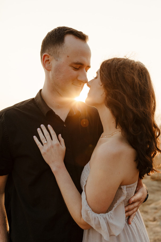 Fort Bragg-Mendocino-Northern CA-Nor Cal-engagement photos-coastal cliffs-ocean engagement photos-engagement hair-what to wear for engagement photos-Sun Flare-Engagement Ring Photo-Golden Hour