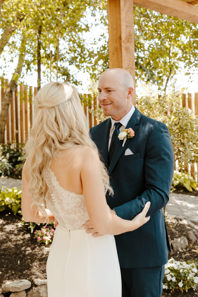 Rachel Christopherson Photography-Sacramento Garden Wedding-Rustic Wedding-Summer Wedding-Northern California-Nor Cal-Bride and Groom-Lace Back Wedding Dress-Bride and Groom First Look-Navy Suit-Bridal Hair
