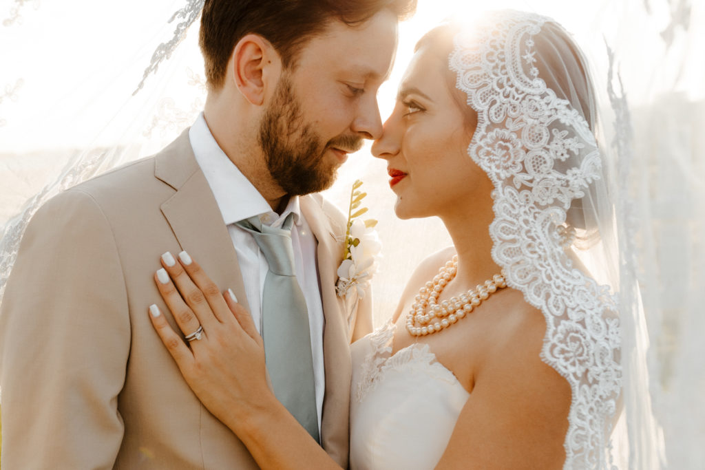 rachelchristophersonphotography-northern califorrnia wedding-traditional wedding-nor cal wedding-traditional ceremony-northern california wedding photographer-sacramento wedding-sacramento wedding photographer-ranch wedding-golden hour-lacey wedding dress-beige grooms suit-long train veil-bridal veil