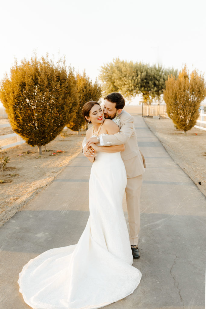 rachelchristophersonphotography-northern califorrnia wedding-traditional wedding-nor cal wedding-traditional ceremony-northern california wedding photographer-sacramento wedding-sacramento wedding photographer-ranch wedding-golden hour-lacey wedding dress-beige grooms suit-long train veil-bridal veil