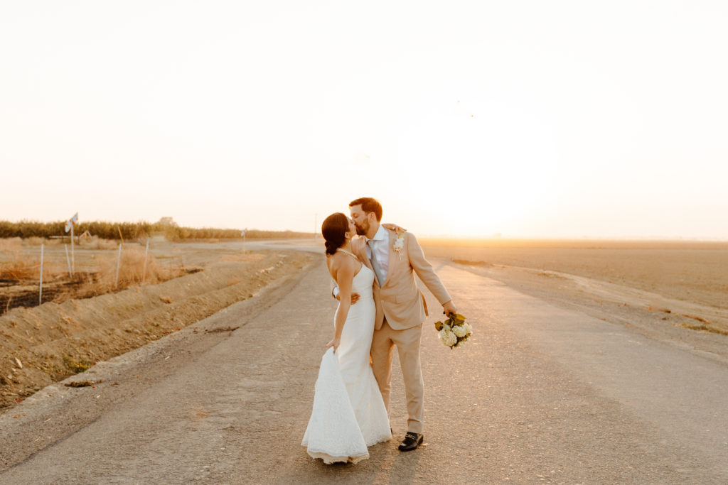 rachelchristophersonphotography-northern califorrnia wedding-traditional wedding-nor cal wedding-traditional ceremony-northern california wedding photographer-sacramento wedding-sacramento wedding photographer-ranch wedding-golden hour-lacey wedding dress-beige grooms suit-long train veil-bridal veil