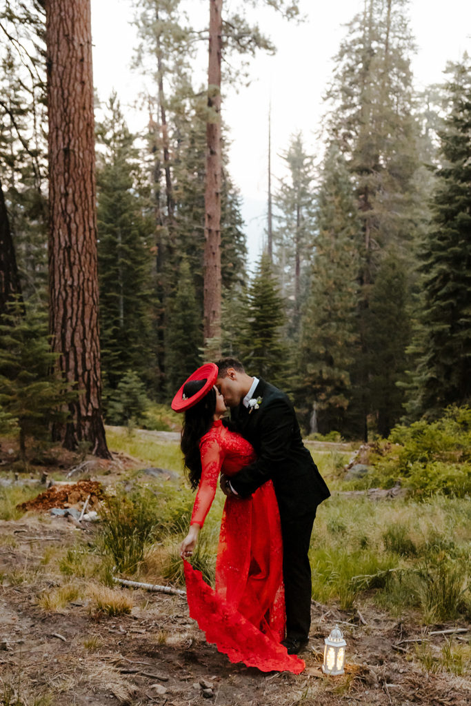 rachelchristophersonphotos-glacier point yosemite elopement-yosemite elopement-glacier point elopement-mountain top elopement-northern california elopement-bride and groom-slick black suit-traditional vietnamese wedding dress