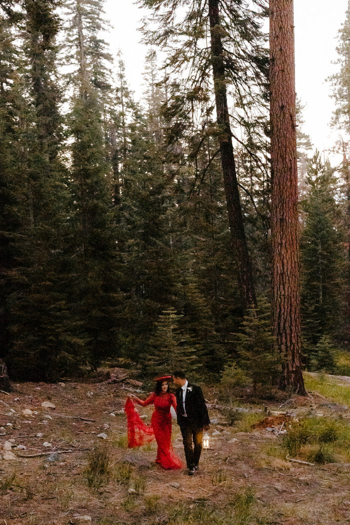 rachelchristophersonphotos-glacier point yosemite elopement-yosemite elopement-glacier point elopement-mountain top elopement-northern california elopement-bride and groom-slick black suit-traditional vietnamese wedding dress