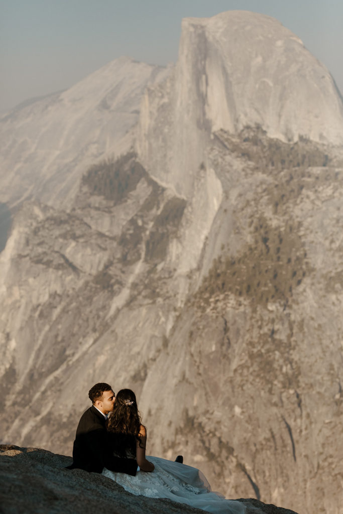 rachelchristophersonphotos-glacier point yosemite elopement-yosemite elopement-glacier point elopement-mountain top elopement-northern california elopement-bride and groom-slick black suit-lacey floral wedding gown