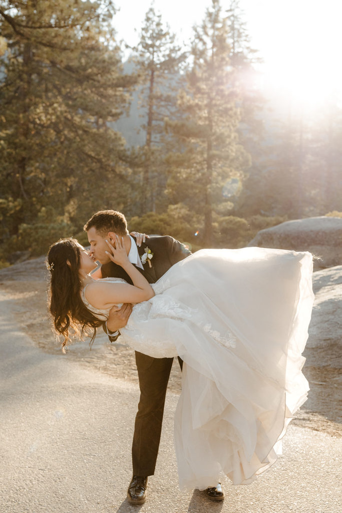 rachelchristophersonphotos-glacier point yosemite elopement-yosemite elopement-glacier point elopement-mountain top elopement-northern california elopement-bride and groom-slick black suit-lacey floral wedding gown