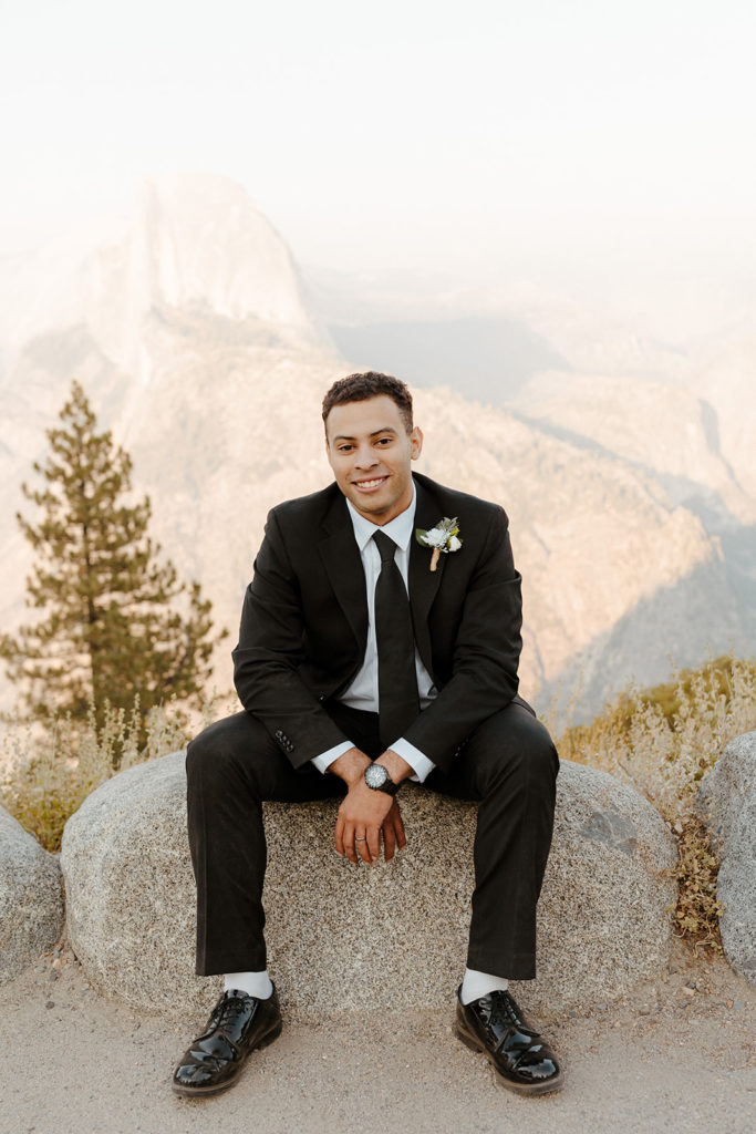 rachelchristophersonphotos-glacier point yosemite elopement-yosemite elopement-glacier point elopement-mountain top elopement-northern california elopement-bride and groom-slick black suit-lacey floral wedding gown